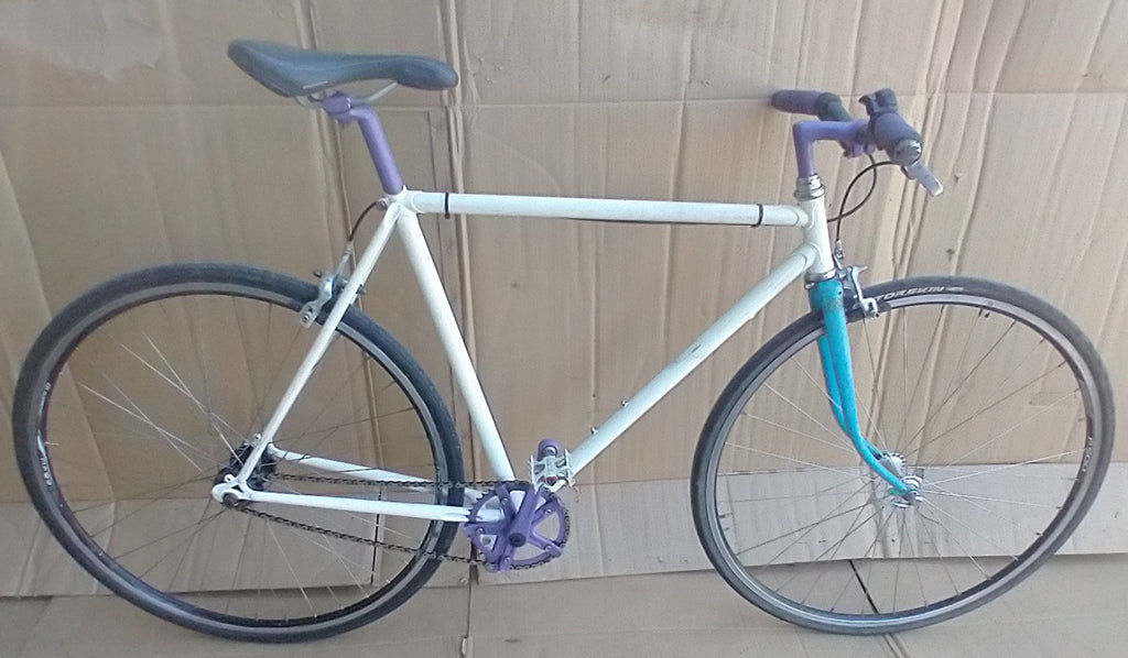 Flix Flop Fixie with purple and white accents. 52cm. used. consignment, no tax, no warranty